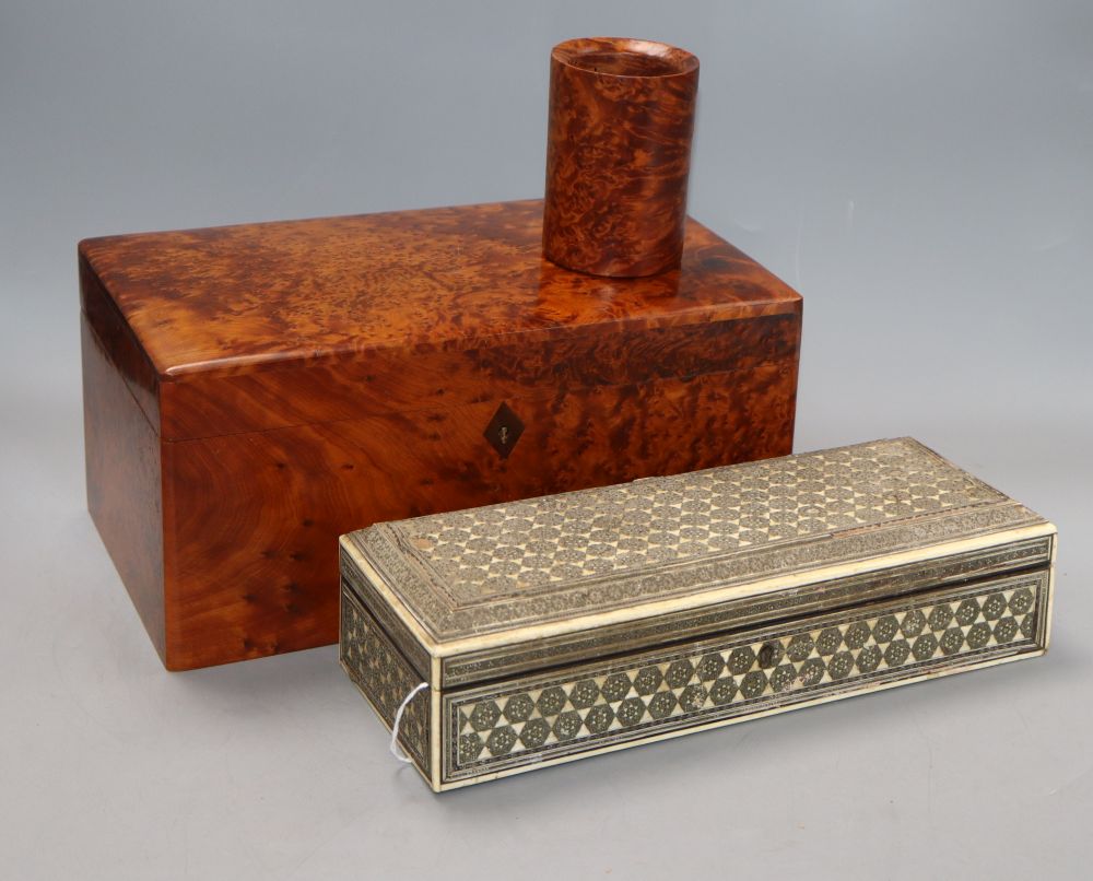 An amboyna jewellery box, 30 x 18 x 14cm, a pen stand and a Damascus box